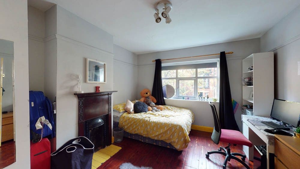 Property photo 2 of 7 Spacious Master Bedroom Featuring A Large Bed, Amp...