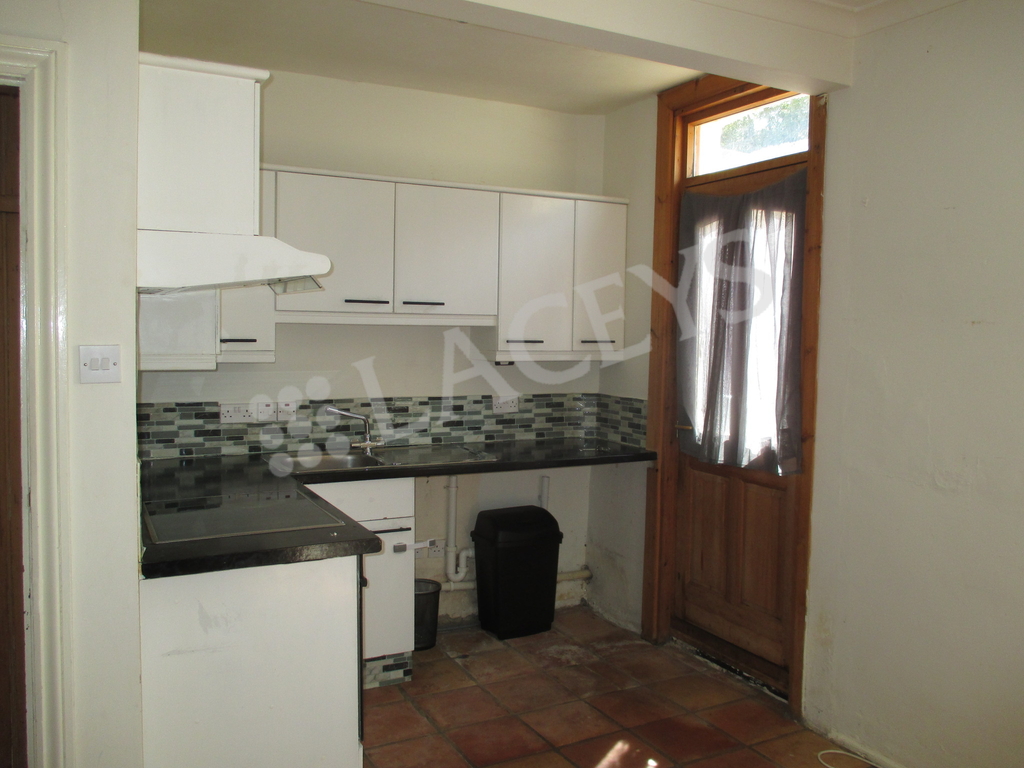 Property photo 2 of 12 Kitchen