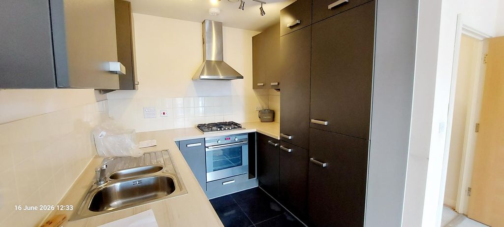 Property photo 3 of 13 Kitchen