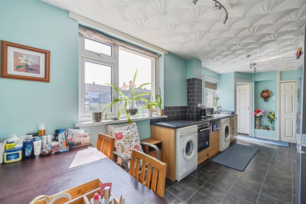 Property photo 3 of 18 Breakfast Kitchen: