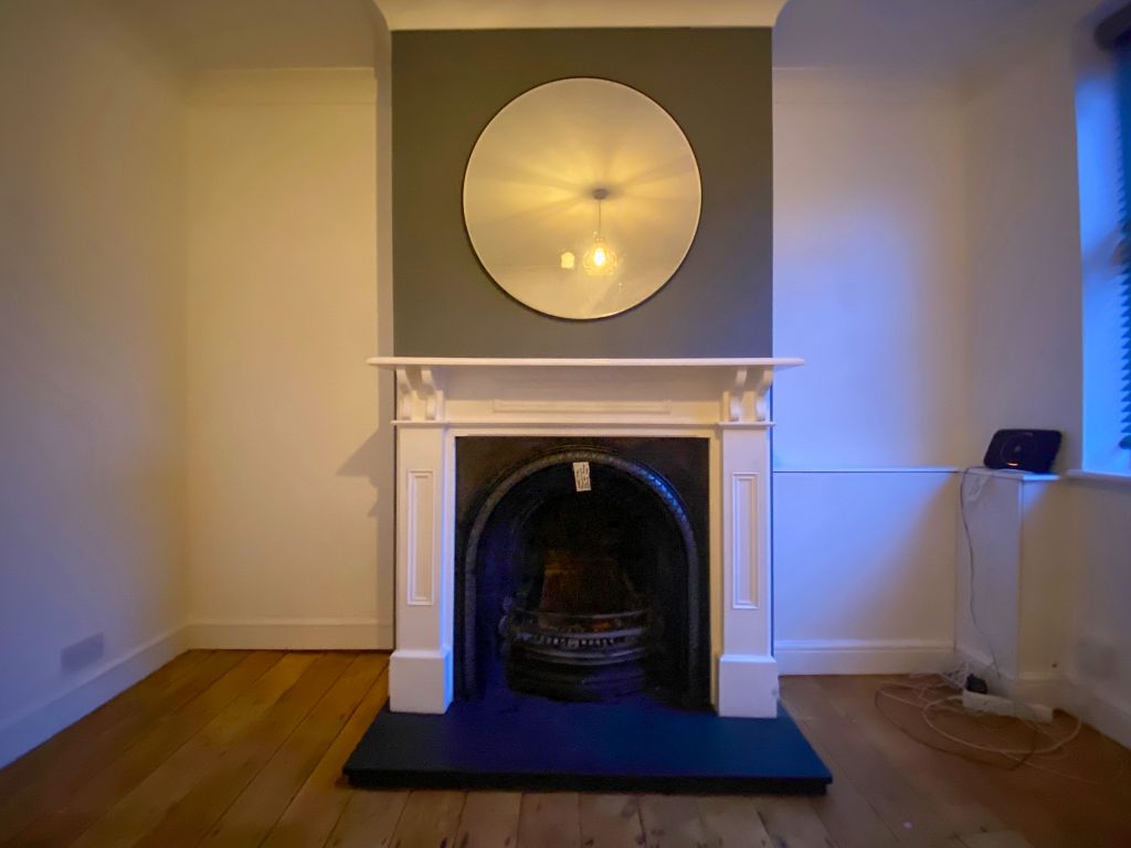 Property photo 3 of 12 Fireplace