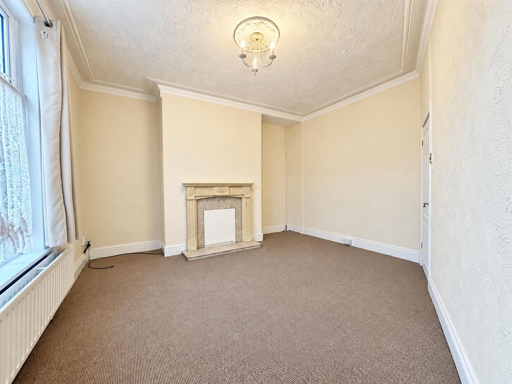 Property photo 3 of 18 Living Room: