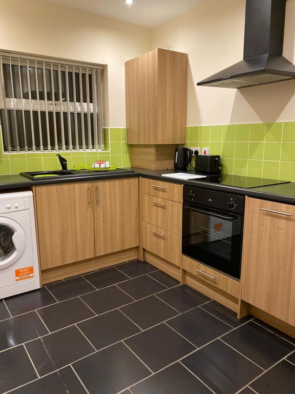 Property photo 2 of 6 Kitchen