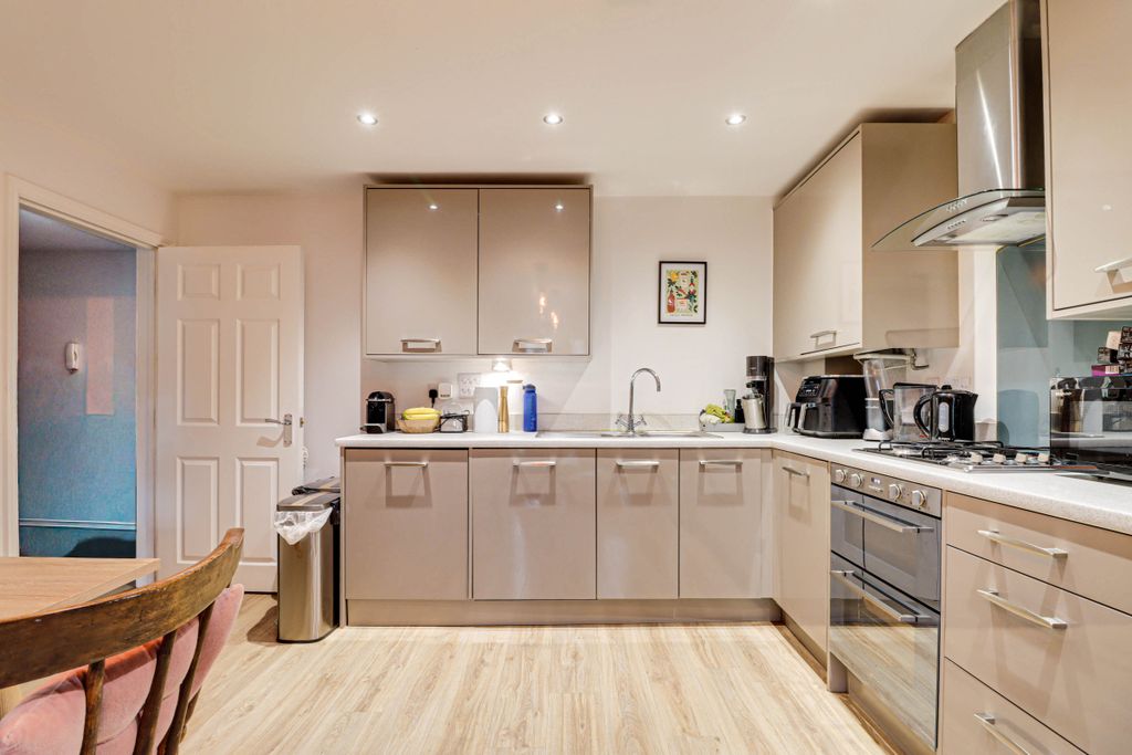 Property photo 3 of 12 Kitchen Area