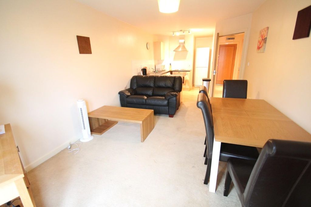 Property photo 1 of 8 Living Area