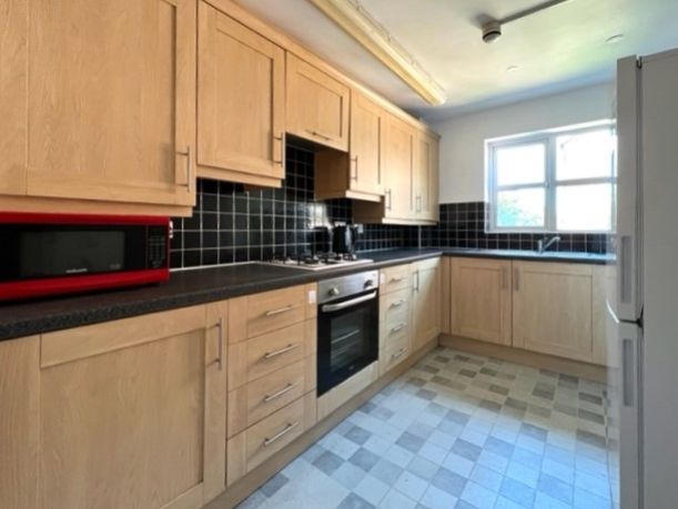Property photo 3 of 10 Kitchen At 21