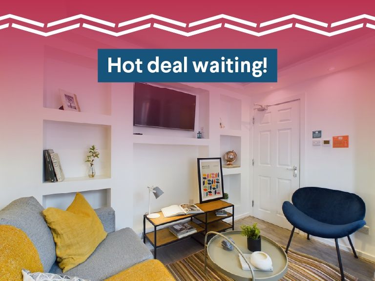 Property photo 2 of 17 A Modern, Well-Lit Living Room With Stylish Furnit...