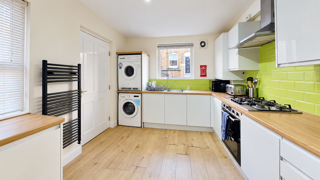 Property photo 2 of 16 Modern Lime-Green Tiled Utility Kitchen