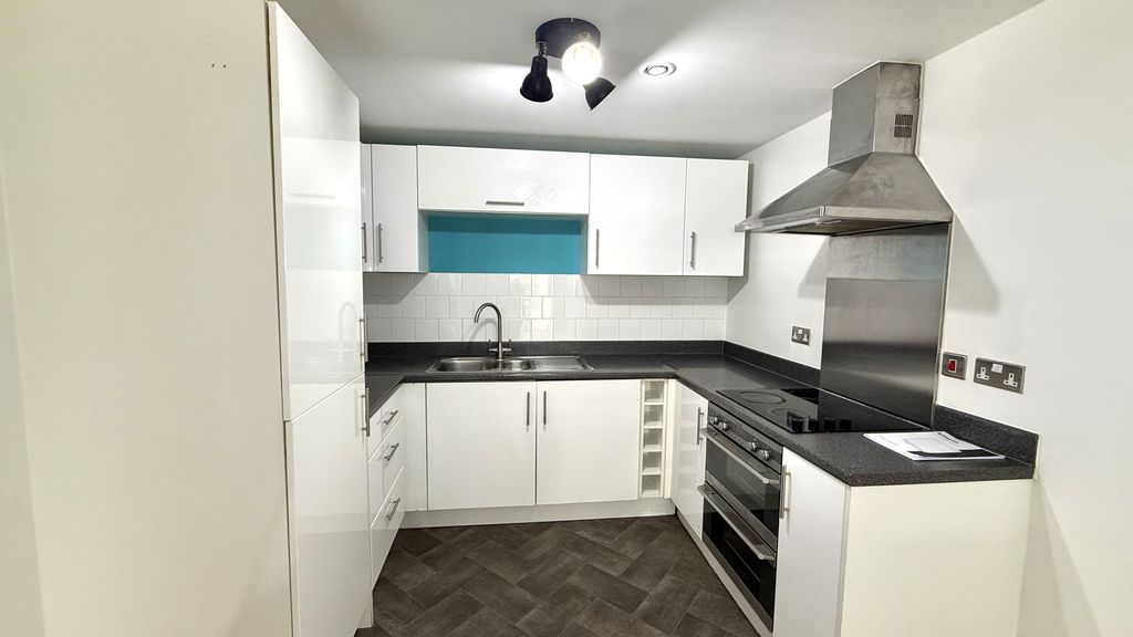 Property photo 2 of 12 Kitchen