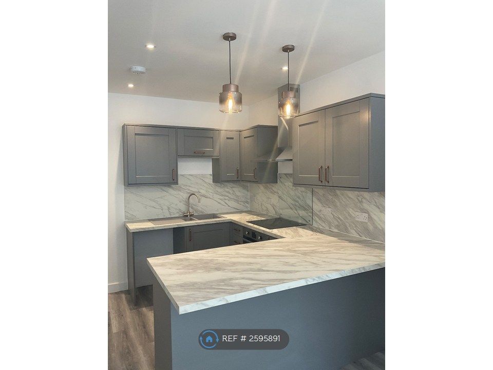 Property photo 2 of 9 Fitted Kitchen With Breakfast Bar.