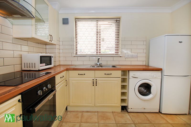 Property photo 3 of 8 Kitchen