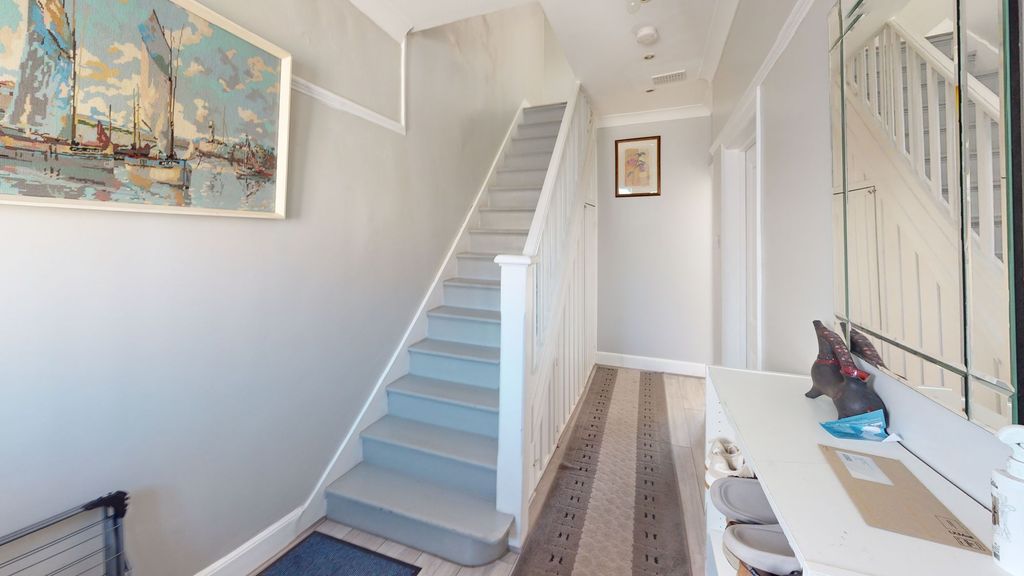 Property photo 3 of 10 A Welcoming And Bright Entrance Hall.