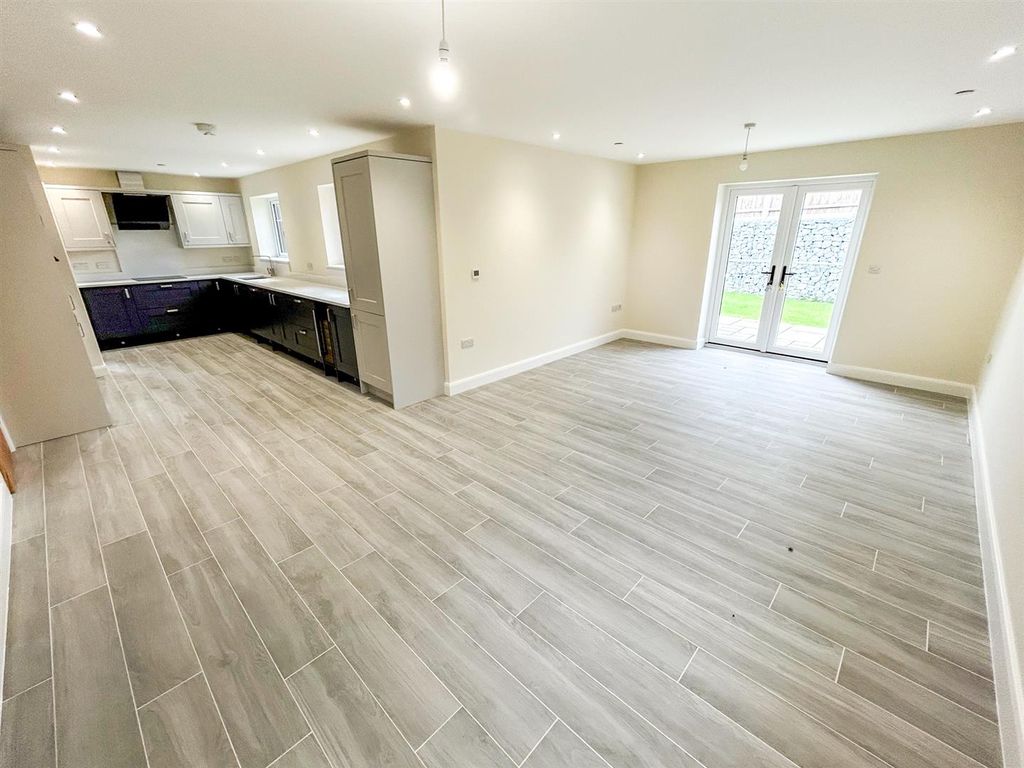 Property photo 3 of 18 Kitchen/Dining/Family Room