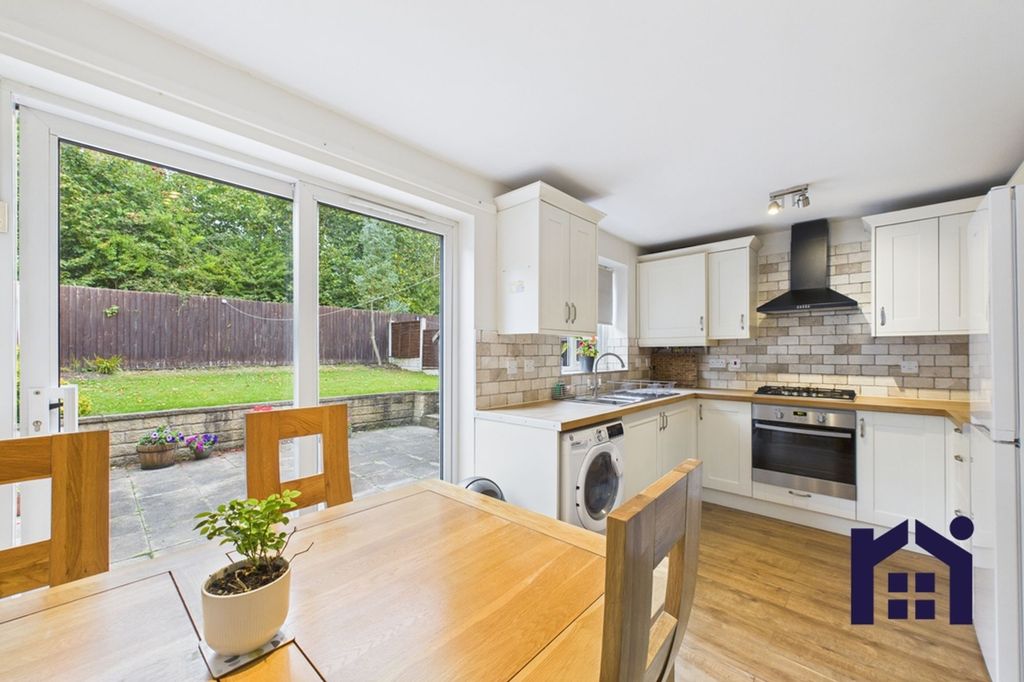 Property photo 3 of 17 Dining Kitchen