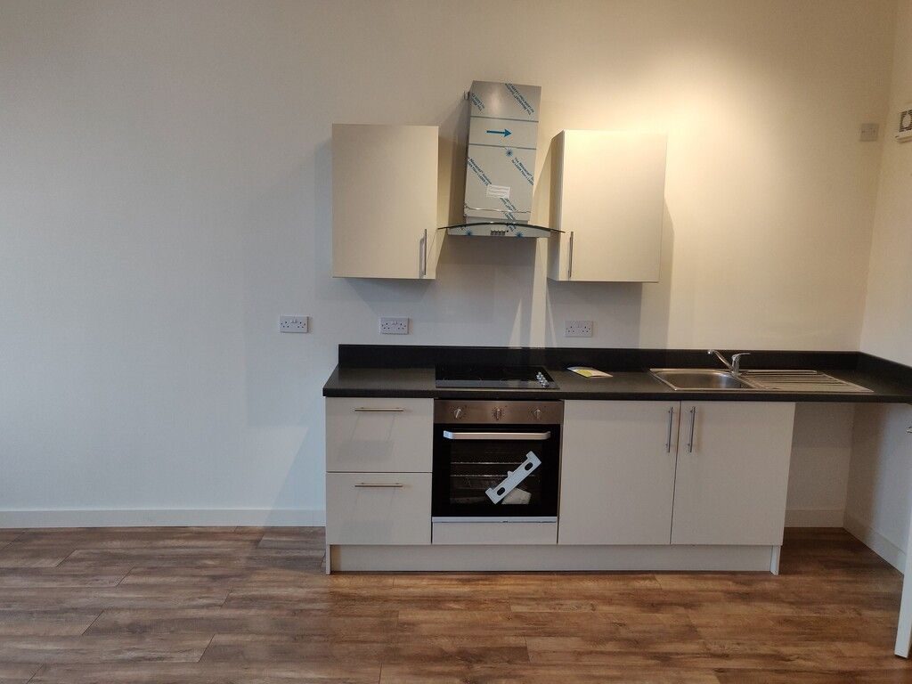 Property photo 3 of 8 Kitchen