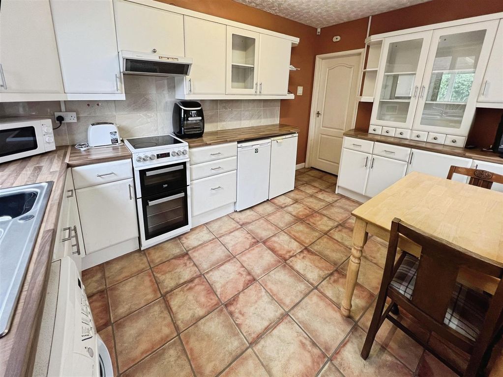 Property photo 2 of 13 Dining Kitchen