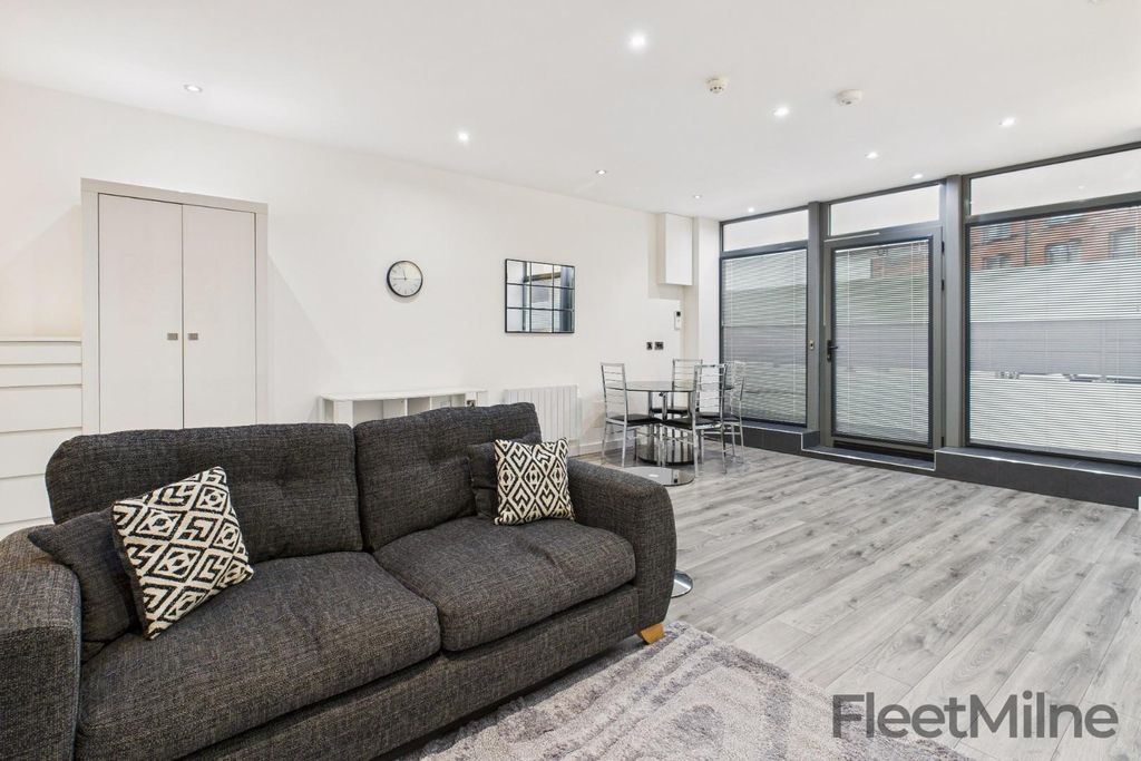 Property photo 1 of 13 Living Area