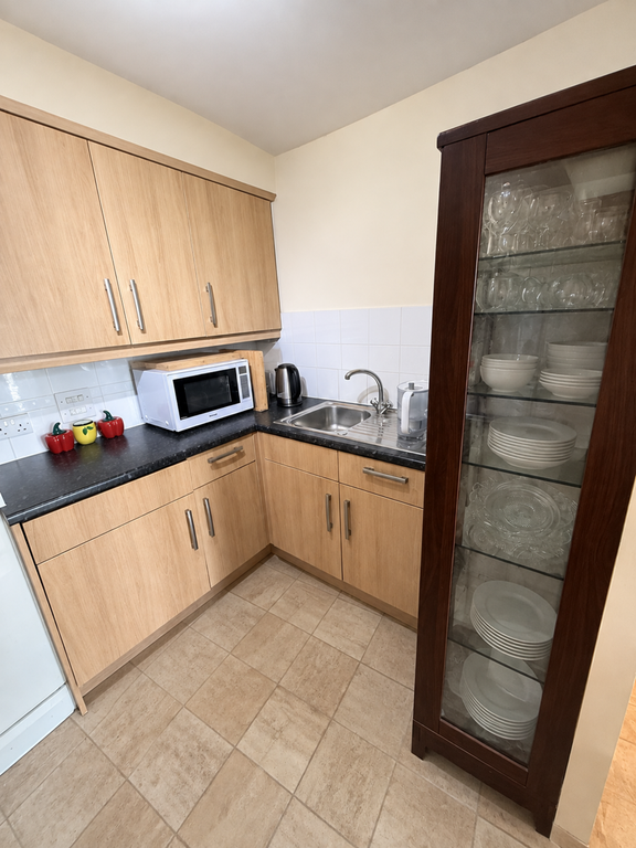 Property photo 3 of 8 Kitchen