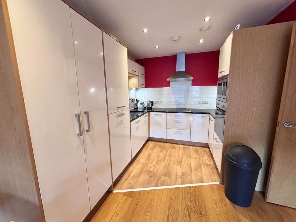 Property photo 3 of 12 Kitchen