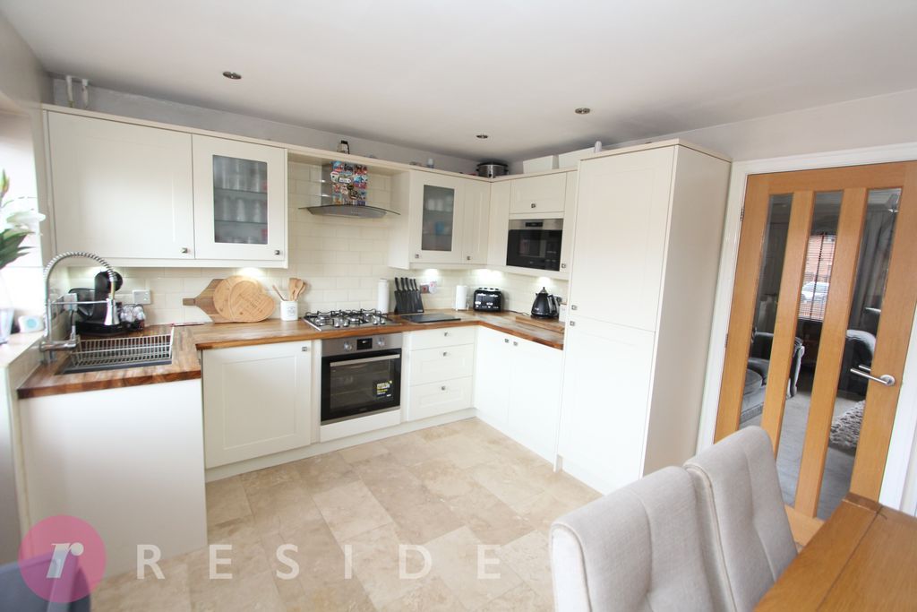 Property photo 3 of 13 Dining Kitchen