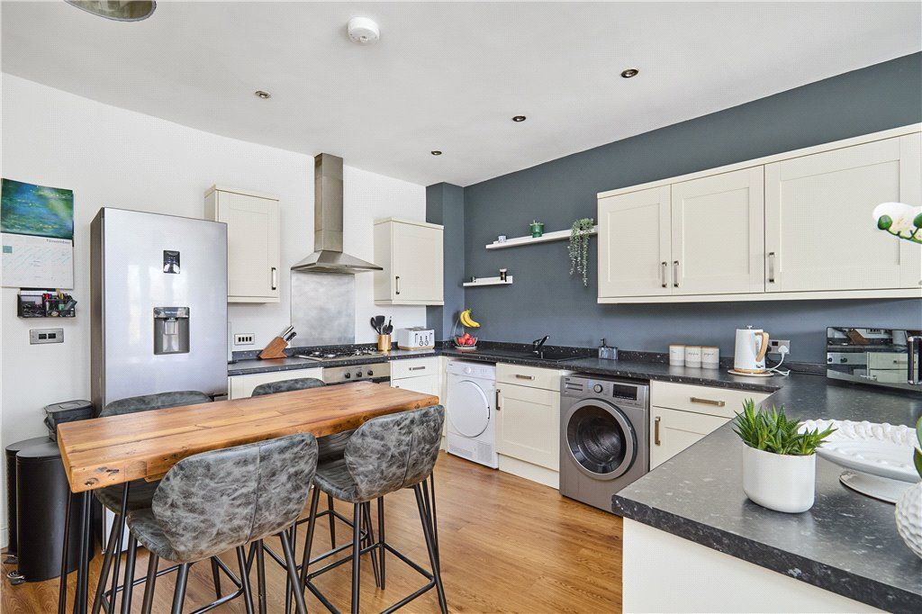 Property photo 3 of 14 Dining Kitchen