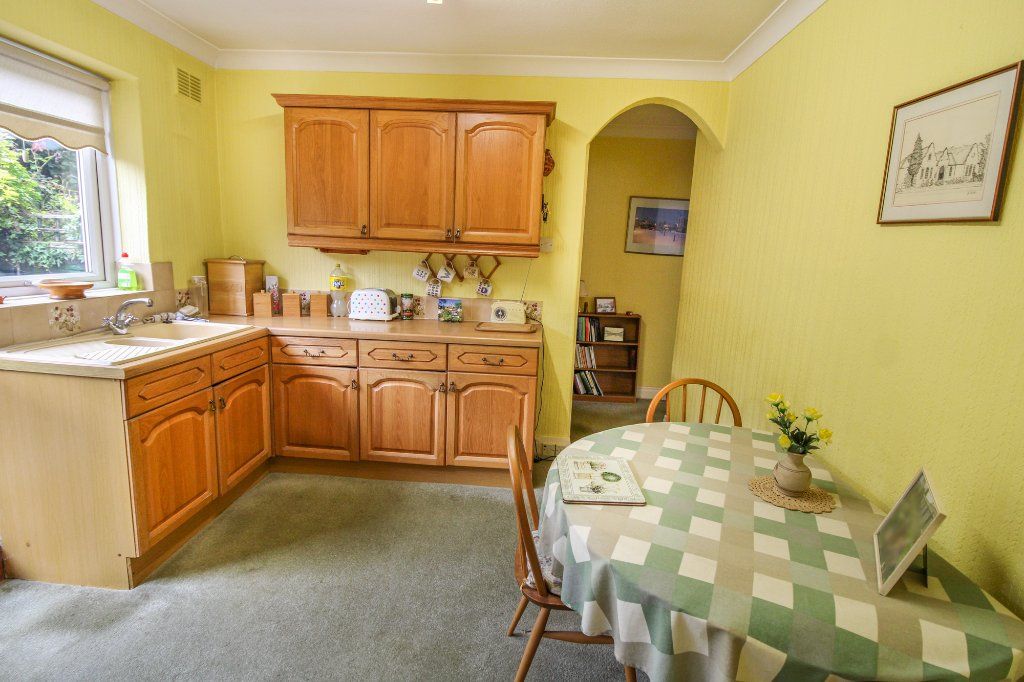Property photo 3 of 13 Dining Kitchen