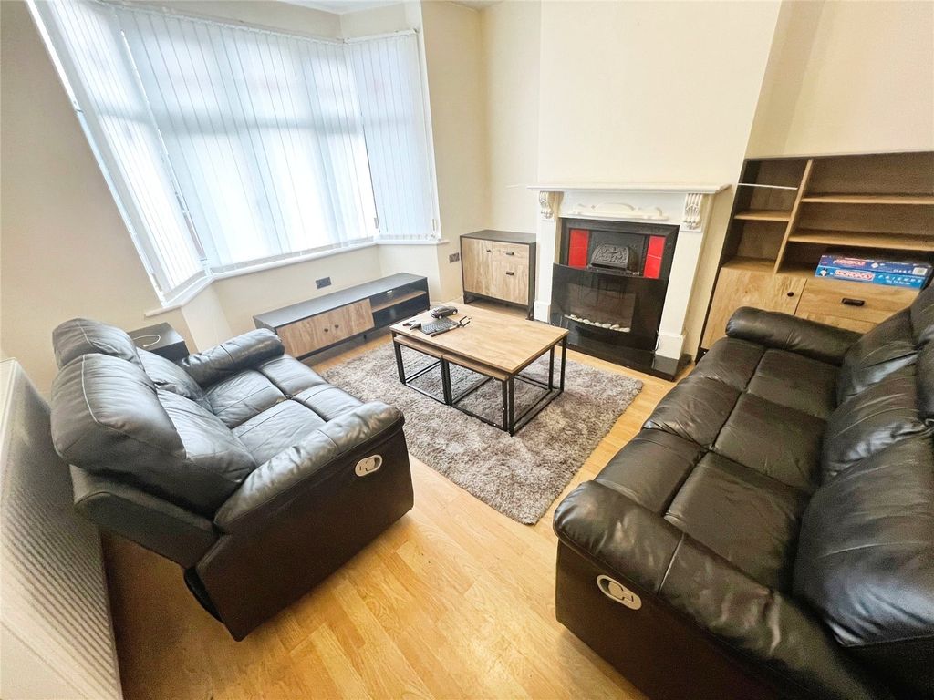 Property photo 2 of 11 Front Living Room