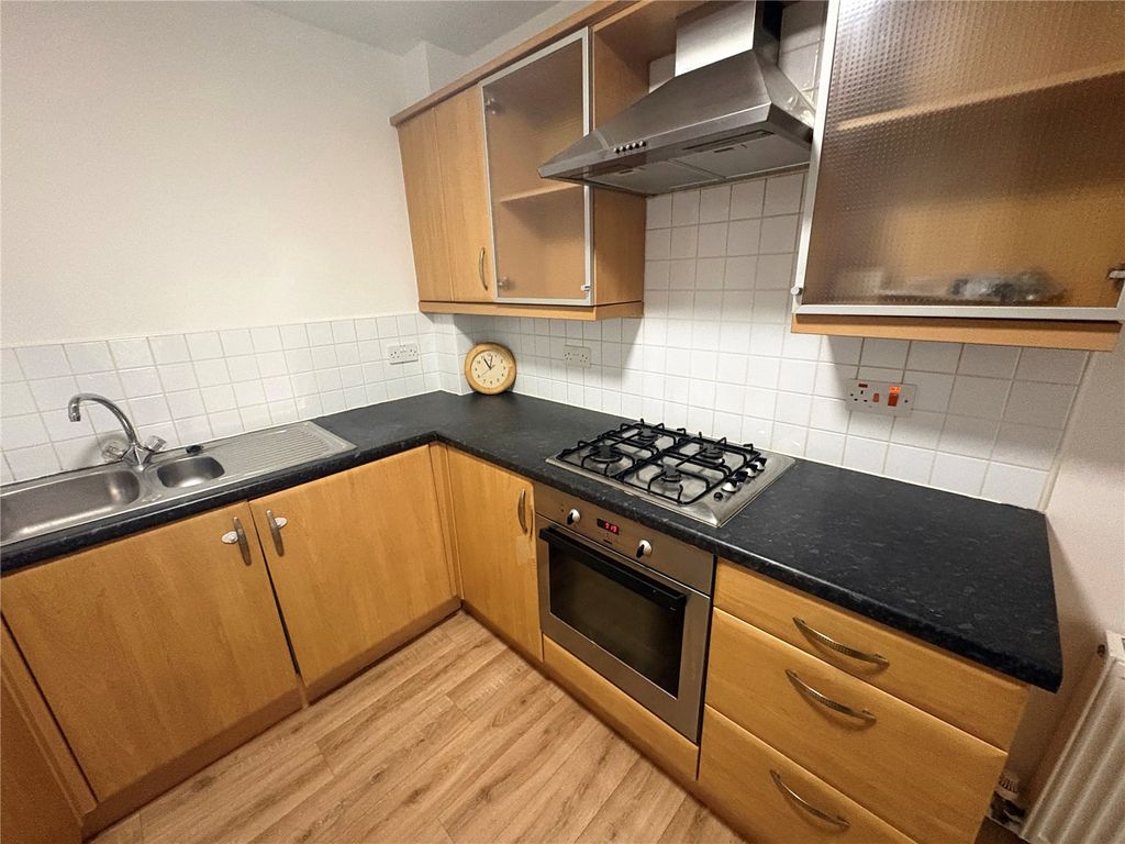 Property photo 3 of 7 Kitchen