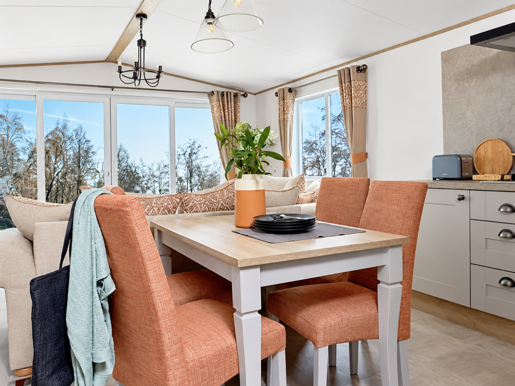 Property photo 3 of 5 Bright Open Plan Dining Area With Upholstered Chairs And Large Windows In The Abi Ambleside