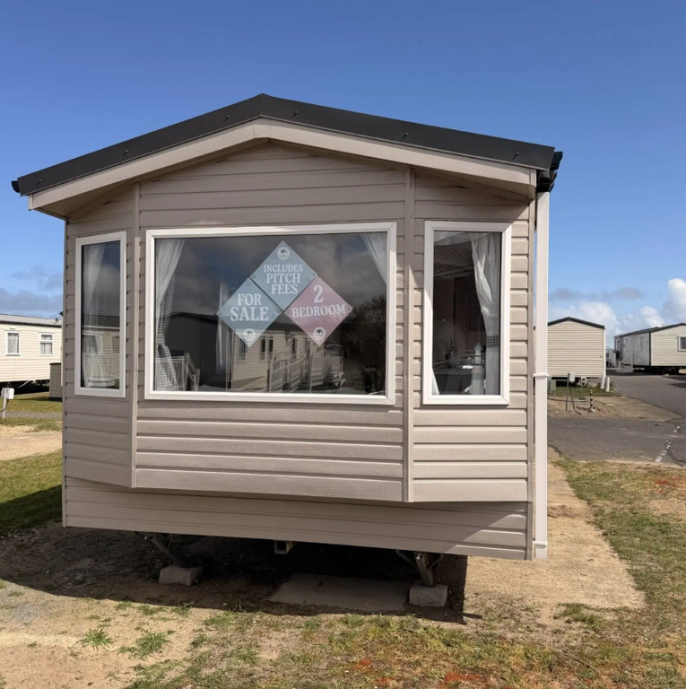 Property photo 1 of 9 Exterior Of The Atlas Festival Holiday Caravan For Sale At Eastern Beach Holiday Park, Norfolk