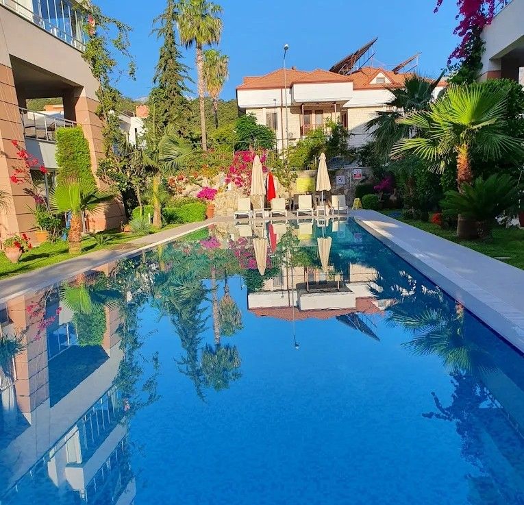 Property photo 2 of 21 Apartment In Antalya For Sale Near The Beach In Kemer - Communal Pool And Social Terraces