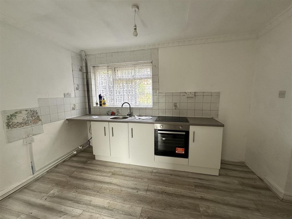 Property photo 3 of 16 Spacious Kitchen With Modern Fitted Units And Oven...