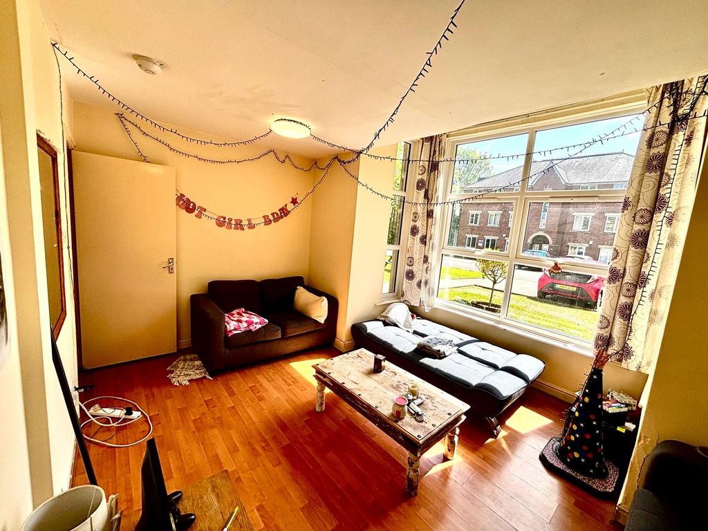 Property photo 1 of 6 Bright And Welcoming Living Room With Large Window...