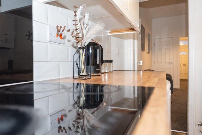 Property photo 2 of 11 Bright, Modern Kitchen Countertop With A Sleek Ind...