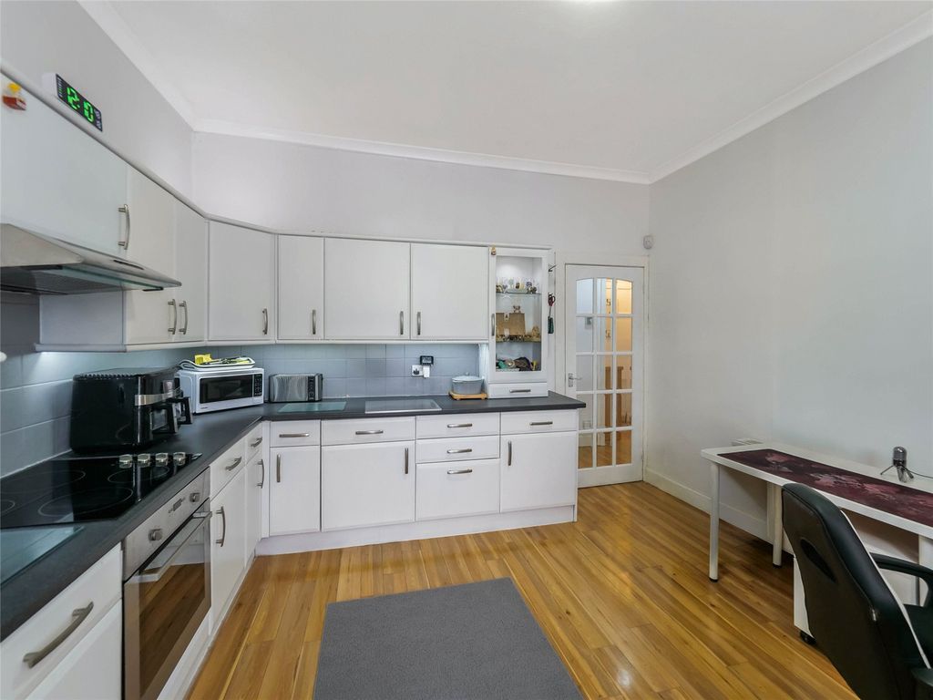 Property photo 3 of 18 Dining Kitchen