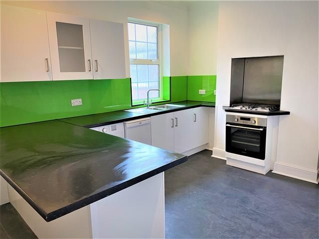 Property photo 3 of 8 Kitchen