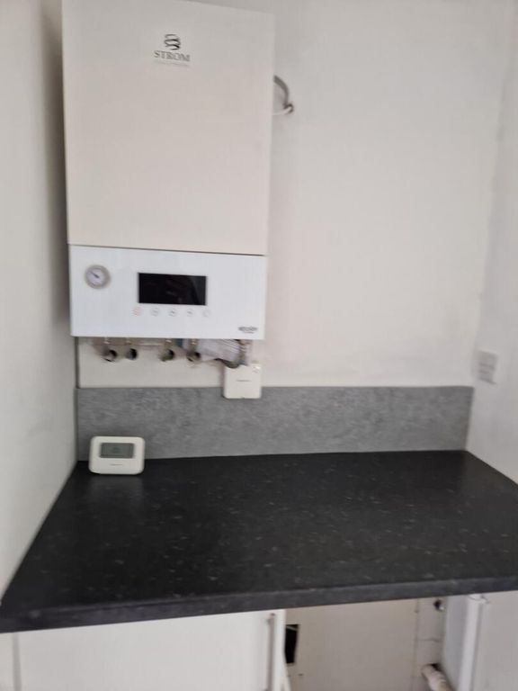 Property photo 2 of 7 Utility Room