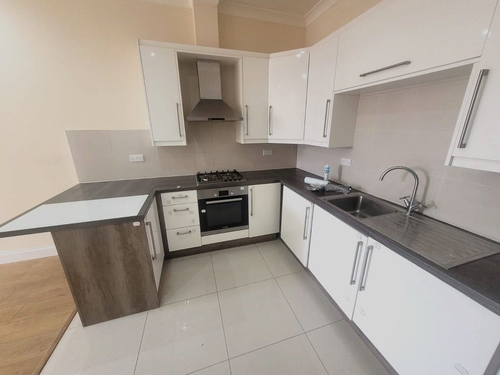 Property photo 3 of 7 Kitchen