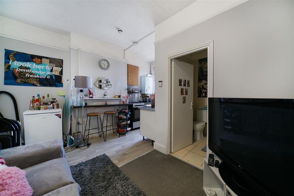 Property photo 2 of 11 Kitchen With Breakfast Bar