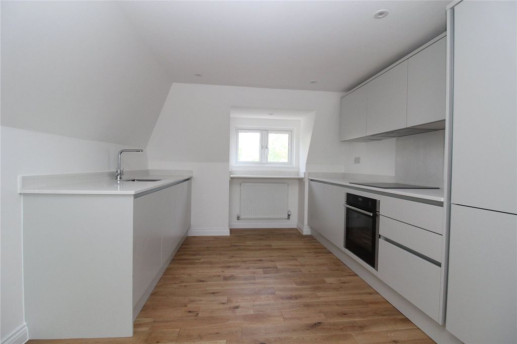 Property photo 3 of 8 Kitchen Area