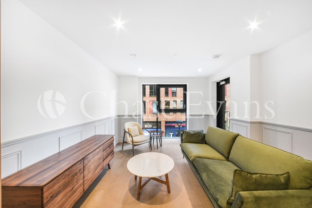 Property photo 2 of 13 Living Area