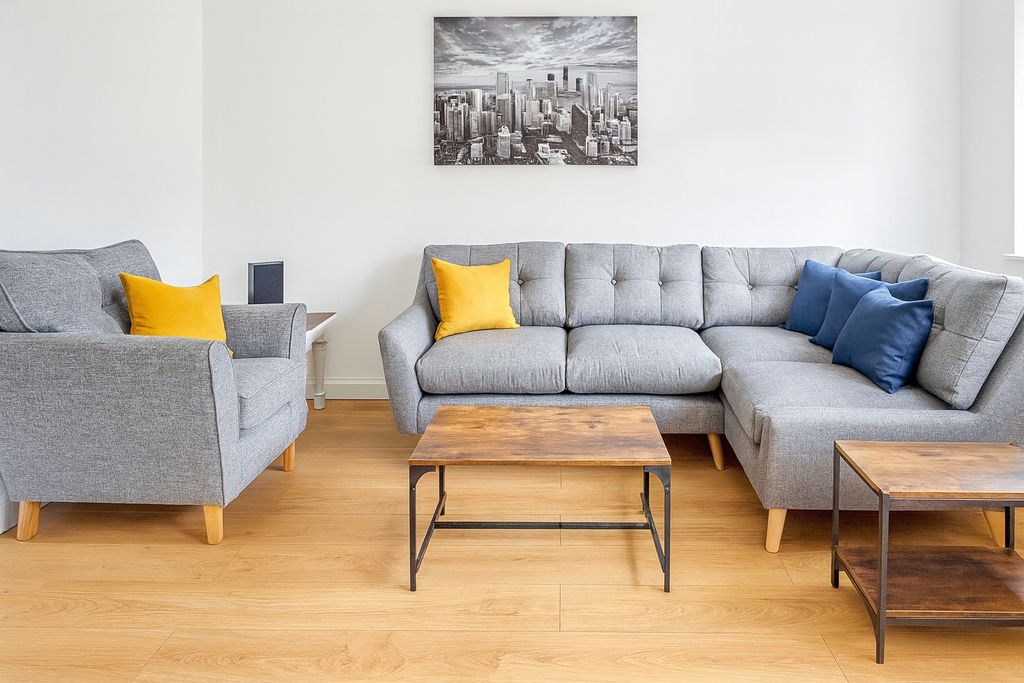 Property photo 2 of 8 Bright And Inviting Living Room Featuring Contempo...