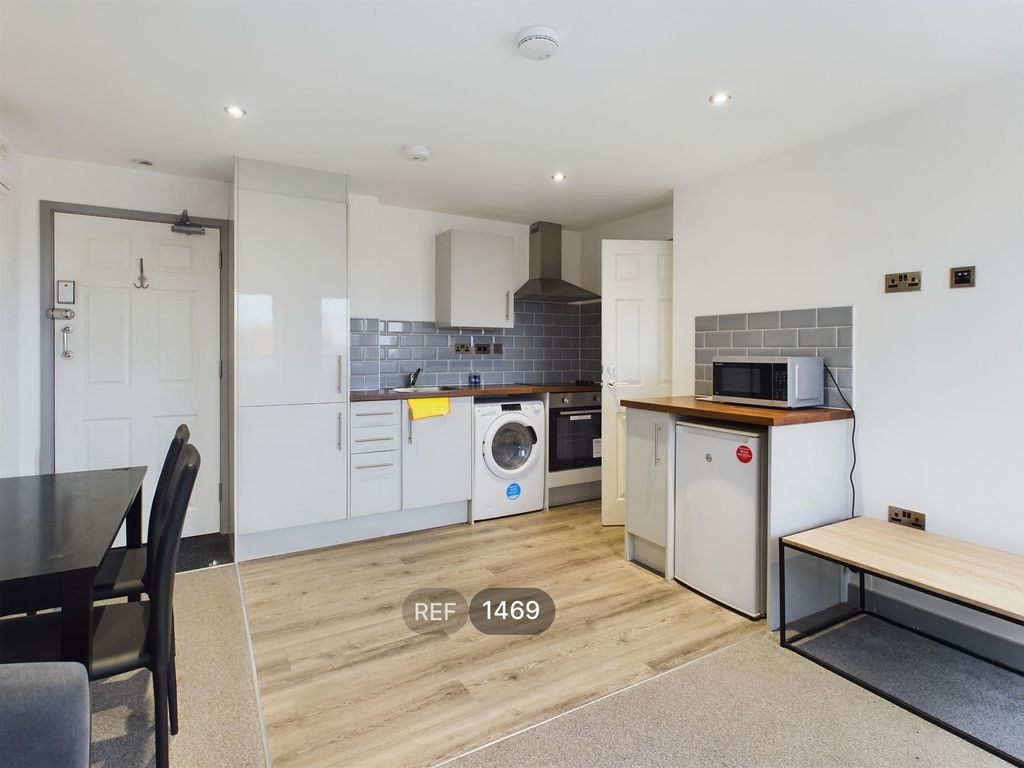 Property photo 3 of 12 Kitchen & Living Area