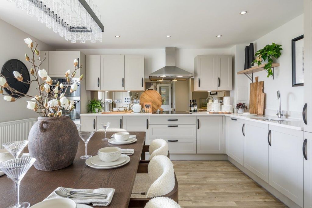 Property photo 3 of 10 Kitchen With Dining Table In 4 Bed Detached Home