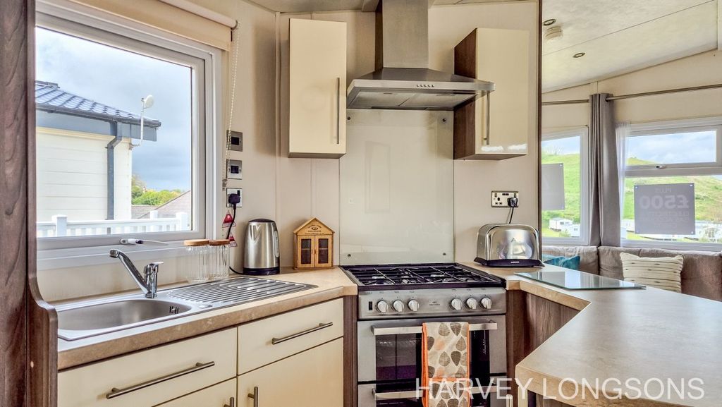Property photo 3 of 18 Fitted Kitchen And Dining Area In The Delta Ascot Holiday Home At Waterside Holiday Park