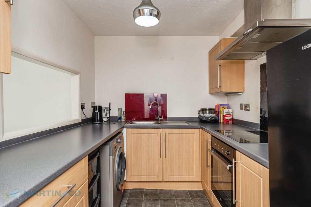 Property photo 3 of 12 2. Kitchen