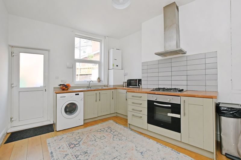 Property photo 3 of 17 Dining Kitchen