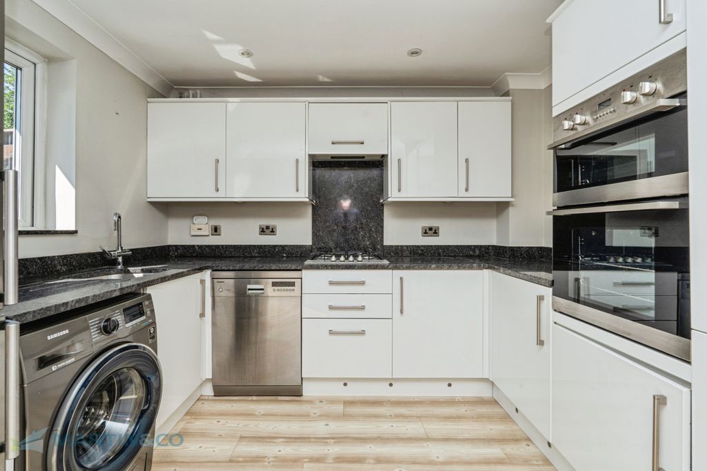 Property photo 3 of 17 2A. Kitchen