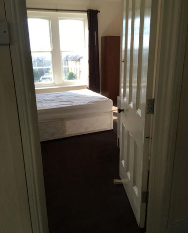 Property photo 3 of 17 A Double Bedroom With A Bed Frame And Large Window...