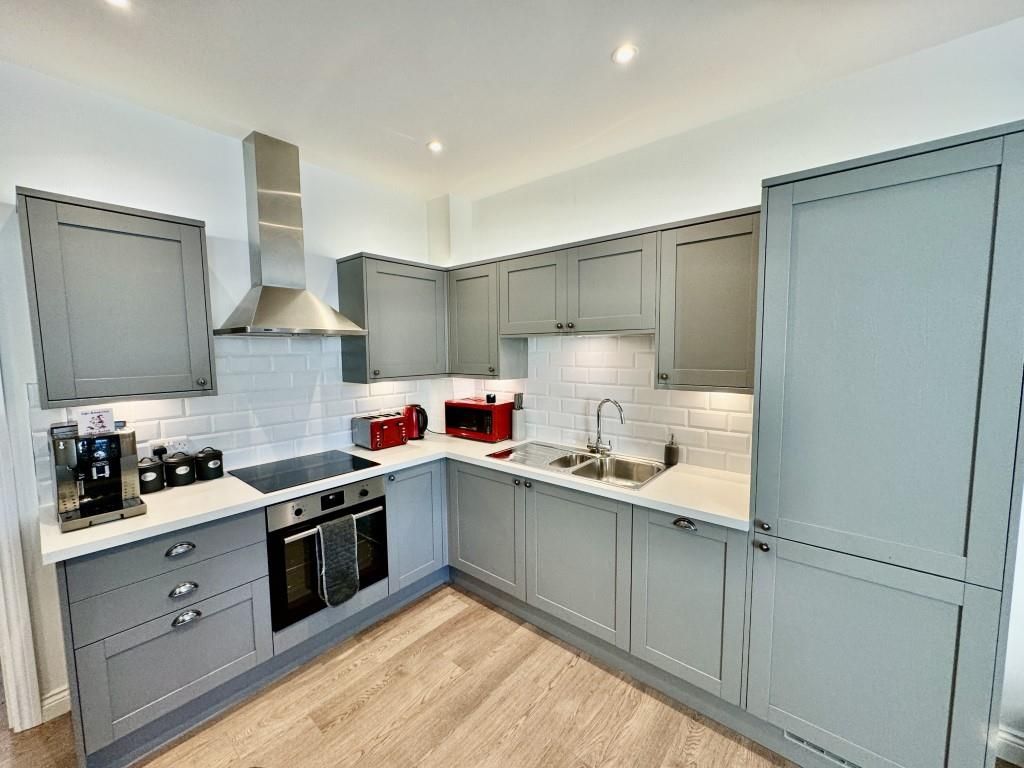 Property photo 2 of 12 Kitchen